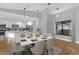 Bright dining area with marble table and kitchen access at 4030 Bibb Ln, Orlando, FL 32817