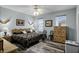 Spacious main bedroom with wood flooring and ceiling fan at 6019 Live Oak Dr, Winter Haven, FL 33880