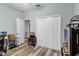 Bedroom with spacious closet and a view of another room at 6019 Live Oak Dr, Winter Haven, FL 33880