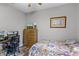 Bedroom with a double bed, a home office setup, and a dresser at 6019 Live Oak Dr, Winter Haven, FL 33880