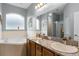 Bathroom features a corner soaking tub and double vanity at 6019 Live Oak Dr, Winter Haven, FL 33880