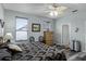 Main bedroom with king-size bed, ensuite bathroom access, and walk-in closet at 6019 Live Oak Dr, Winter Haven, FL 33880