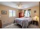Bedroom with a double bed and a wooden dresser at 653 Pelican Bay Dr, Daytona Beach, FL 32119