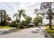 Gated community entrance with lush landscaping at 653 Pelican Bay Dr, Daytona Beach, FL 32119