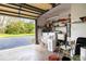 Spacious garage with washer, dryer, and ample storage shelving at 653 Pelican Bay Dr, Daytona Beach, FL 32119