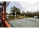 Two tennis courts in a lush, green setting at 653 Pelican Bay Dr, Daytona Beach, FL 32119