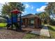 Community playground with covered picnic tables at 6893 Hidden Glade Pl, Sanford, FL 32771