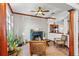 Living room with fireplace and seating at 1562 Anorada Blvd, Kissimmee, FL 34744