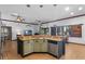 Modern kitchen with granite countertops and custom cabinetry at 1562 Anorada Blvd, Kissimmee, FL 34744