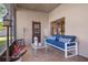 Relaxing screened porch with comfortable seating and decorative accents at 1562 Anorada Blvd, Kissimmee, FL 34744