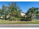 House exterior with lush landscaping at 1562 Anorada Blvd, Kissimmee, FL 34744