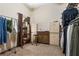 Large walk-in closet with ample hanging space and shelving at 1562 Anorada Blvd, Kissimmee, FL 34744