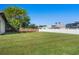Large grassy backyard, perfect for recreation and relaxation at 1562 Anorada Blvd, Kissimmee, FL 34744