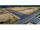 Aerial view of road construction within a new community at 16862 Muskgrass Dr, Winter Garden, FL 34787