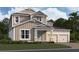 Two-story craftsman style home with two-car garage at 16862 Muskgrass Dr, Winter Garden, FL 34787