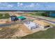 Aerial view of new homes under construction, showcasing various stages at 16862 Muskgrass Dr, Winter Garden, FL 34787