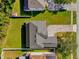 Aerial view showcasing the house and driveway at 3211 Eagle Watch Dr, Kissimmee, FL 34746