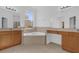Main bathroom with corner bathtub and double vanity at 3211 Eagle Watch Dr, Kissimmee, FL 34746