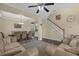 Open concept dining room with seating for six and views to living room at 1161 Cathcart Cir, Sanford, FL 32771