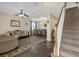 Bright living room with staircase and access to dining and entry at 1161 Cathcart Cir, Sanford, FL 32771