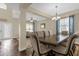 Formal dining room with dark wood table and seating for six at 1161 Cathcart Cir, Sanford, FL 32771