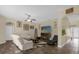 Living room with fireplace, sectional sofa and large TV at 1161 Cathcart Cir, Sanford, FL 32771