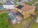 Aerial view of two-story house with solar panels and pool at 1161 Cathcart Cir, Sanford, FL 32771