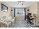 Bedroom with a desk setup and plenty of natural light at 1161 Cathcart Cir, Sanford, FL 32771