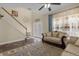 Living room features entryway, staircase and comfortable seating at 1161 Cathcart Cir, Sanford, FL 32771