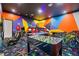 Entertaining game room with foosball, ping pong and bikes at 1529 Corolla Ct, Reunion, FL 34747