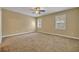 Spacious bedroom with neutral walls and carpeted floor at 1938 Michael Tiago Cir, Maitland, FL 32751