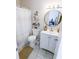 Clean bathroom with updated vanity, a shower/tub combo, and neutral tile at 3053 George Mason Ave # D, Winter Park, FL 32792