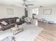 Open concept living room with a view into the kitchen at 3053 George Mason Ave # D, Winter Park, FL 32792