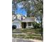 Two-story house with attached garage and front porch at 6776 Brittany Chase Ct, Orlando, FL 32810