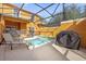 Private pool area with a grill at 8962 Cuban Palm Rd, Kissimmee, FL 34747