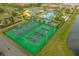 Community tennis and basketball courts near pool at 8962 Cuban Palm Rd, Kissimmee, FL 34747