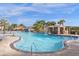 Resort-style pool with a waterfall feature and plenty of lounge chairs at 8962 Cuban Palm Rd, Kissimmee, FL 34747