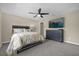 Bright bedroom featuring a TV and dresser at 8962 Cuban Palm Rd, Kissimmee, FL 34747