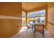Private patio with table and chairs near the pool at 8962 Cuban Palm Rd, Kissimmee, FL 34747