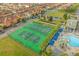 Aerial view of community with tennis and basketball courts at 8962 Cuban Palm Rd, Kissimmee, FL 34747