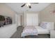 Charming bedroom with twin beds and TV at 8962 Cuban Palm Rd, Kissimmee, FL 34747