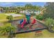 Community playground with slides and playset at 8962 Cuban Palm Rd, Kissimmee, FL 34747