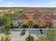 Aerial view of community, showing homes and landscape at 8962 Cuban Palm Rd, Kissimmee, FL 34747