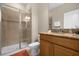 Clean bathroom with shower and granite vanity at 8962 Cuban Palm Rd, Kissimmee, FL 34747