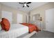 Spacious bedroom with a dresser and a large bed at 8962 Cuban Palm Rd, Kissimmee, FL 34747