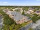 Aerial view of community, showcasing building and landscaping at 14304 Fredricksburg Dr # 420, Orlando, FL 32837