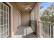Balcony with double doors and screened enclosure at 14304 Fredricksburg Dr # 420, Orlando, FL 32837