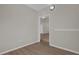 Spacious bedroom with wood-look floors at 14304 Fredricksburg Dr # 420, Orlando, FL 32837