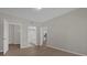 Bedroom with wood-look floors and en-suite bathroom at 14304 Fredricksburg Dr # 420, Orlando, FL 32837