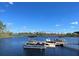 Pontoon boats at a lakefront dock at 14501 Grove Resort Ave # 1332, Winter Garden, FL 34787